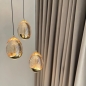 Foto 15116-11: Hanglamp met ronde plafondplaat en drie eivormige glazen in amberkleur