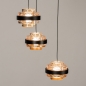 Foto 15210-5: Zwarte hanglamp met drie amberkleurige glazen die trapsgewijs naar beneden hangen
