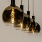 Foto 15248-4: Zwarte hanglamp met vier bollen van goud glas