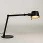 Foto 15424-3 schuinaanzicht: Zwarte bureaulamp met gouden binnenkant en verstelbare knikarm