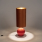 Foto 15580-2 vooraanzicht: Grote vaaslamp als vloerlamp in oranje met smalle, hoge lampenkap van velvet