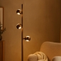 Foto 16233-3: Stijlvolle bronzen vloerlamp voorzien van drie koffiebruine bollen