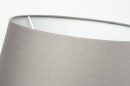 Foto 30787-8: Moderne Stehleuchte aus mattem Messing mit grauem Stoffschirm