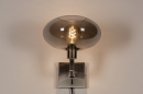 Foto 31105-4 vooraanzicht: Moderne, mat stalen wandlamp voorzien van een rookglazen kap, geschikt voor led verlichting.