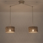 Foto 31519-2: Beige dubbele hanglamp met knikarmen en ronde kappen van bamboe in zwart en naturel 