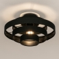 Foto 31821-3: Een grote plafondlamp met vijf ringen van zwarte linnenstof.
