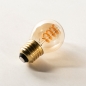 Foto 410-8: LED Filament Kugel Smoke / Bernsteinfarbe dimmbar in 3 Stufen 2200 Kelvinn.
