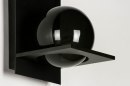 Foto 73111-11: Zwarte moderne wandlamp met bol van rookglas