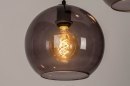 Foto 73663-7 schuinaanzicht: Moderne, trendy hanglamp voorzien van drie retro bollen in rookglas. 