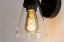 Foto 73976-6 detailfoto: Hippe, mat zwarte wandlamp voorzien van helder glas, geschikt voor led.
