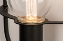 Foto 74171-6: Aparte, grote, ovale wandlamp uitgevoerd in een mat zwarte kleur, geschikt voor vervangbaar led.