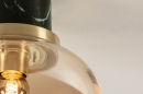 Foto 74637-2 detailfoto: Badkamer plafondlamp van glas in amberkleur met groen marmer en messing. 