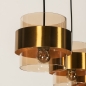 Foto 74710-12: Hanglamp met drie kokers van amberkleurig glas met gouden details