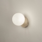 Foto 74904-3 schuinaanzicht: Beige wandlamp met witte bol van opaalglas in japandi stijl 