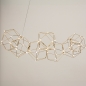 Foto 74978-2 vooraanzicht: Design led hanglamp met prisma-vormen en kleine led lampen