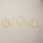 Foto 74979-2 schuinaanzicht: Ronde design led hanglamp met prisma-vormen en kleine led lampen