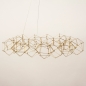 Foto 74979-8 schuinaanzicht: Ronde design led hanglamp met prisma-vormen en kleine led lampen