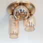 Foto 75135-6: Deckenlampe Gold mit drei verschiedenen Formen von Champagner-Gläsern