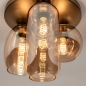 Foto 75135-9: Deckenlampe Gold mit drei verschiedenen Formen von Champagner-Gläsern
