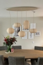 Foto 75179-20 sfeerfoto_uit: Grote japandi hanglamp met vijf lampionnen van beige stof en ovale plafondplaat