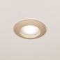 Foto 75517-2: Een ronde (badkamer) inbouwspot van beige aluminium.
