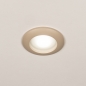 Foto 75517-3: Een ronde (badkamer) inbouwspot van beige aluminium.