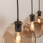 Foto 75779-16: Trendy hanglamp voorzien van drie glazen bollen in een champagnekleur
