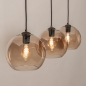 Foto 75779-5: Trendy hanglamp voorzien van drie glazen bollen in een champagnekleur