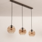 Foto 75779-9: Trendy hanglamp voorzien van drie glazen bollen in een champagnekleur