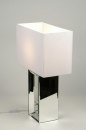 Foto 88221-2: Grote tafellamp voorzien van een spiegelvoet en een witte, stoffen kap.